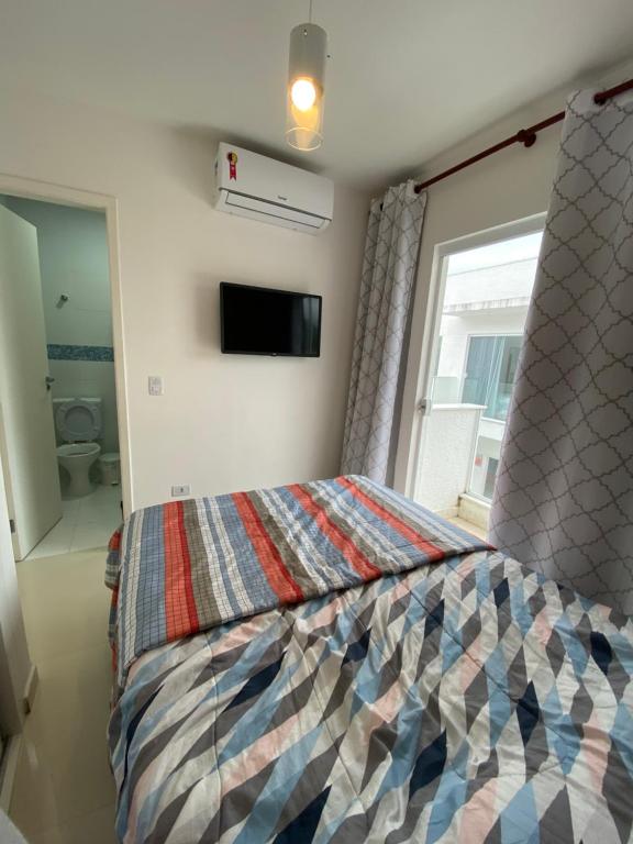  Linda Casa com 03 suítes 150 mts da praia