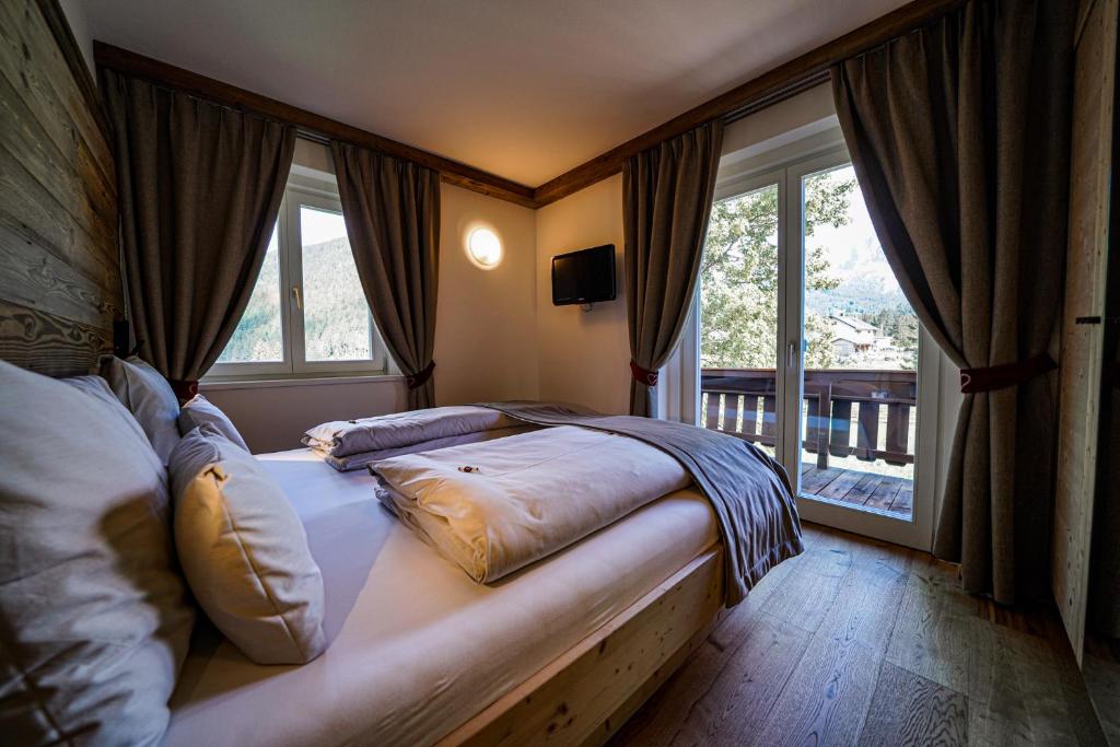 Postel nebo postele na pokoji v ubytování Garni Bergblick