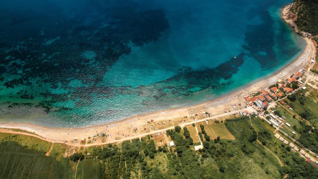 an aerial view of a beach and the ocean at Luxury Apartments Queen in Petrovac na Moru