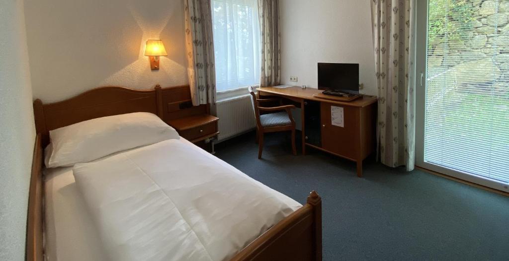 Postel nebo postele na pokoji v ubytování Hotel-Restaurant Faustschlössl