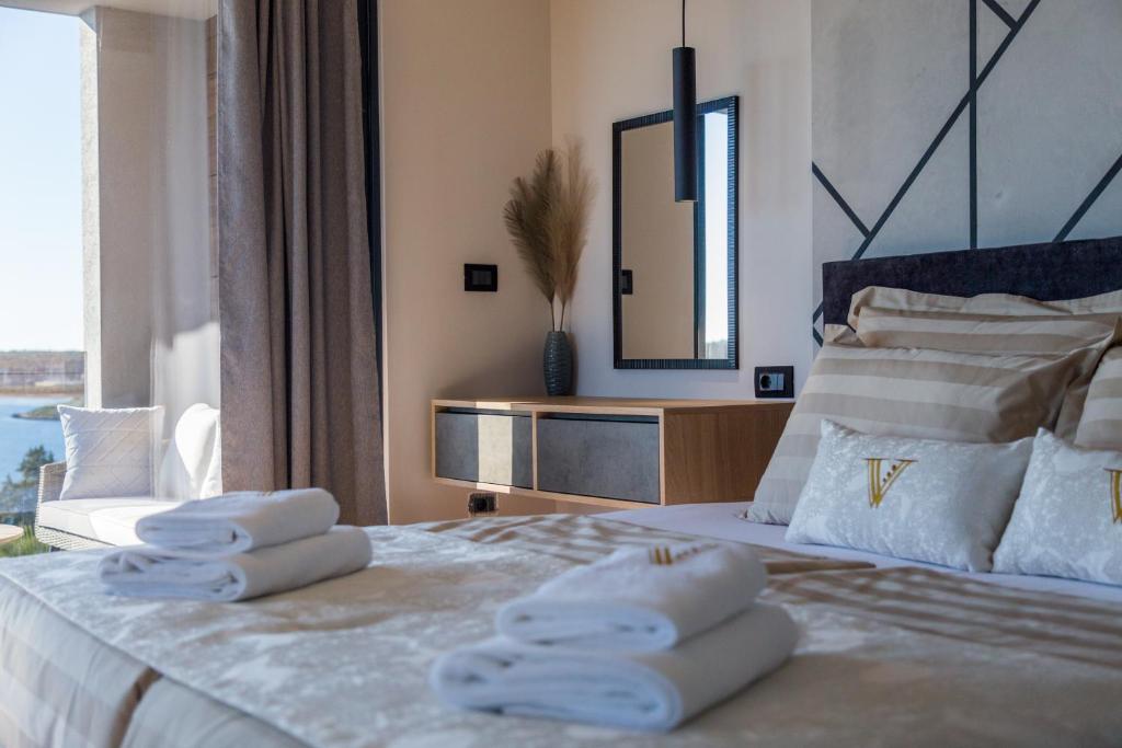 Ein Bett oder Betten in einem Zimmer der Unterkunft Villa Vie