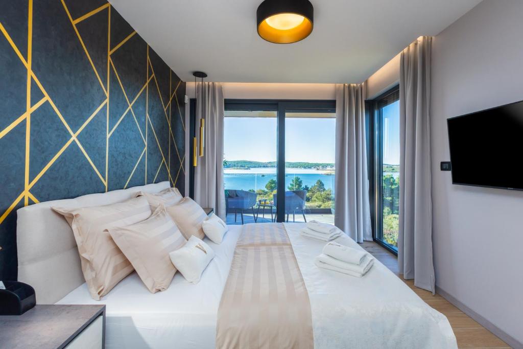 Ein Bett oder Betten in einem Zimmer der Unterkunft Villa Vie