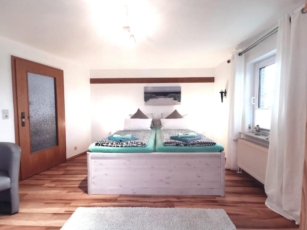 Llit o llits en una habitació de Pension Nele Hohaus