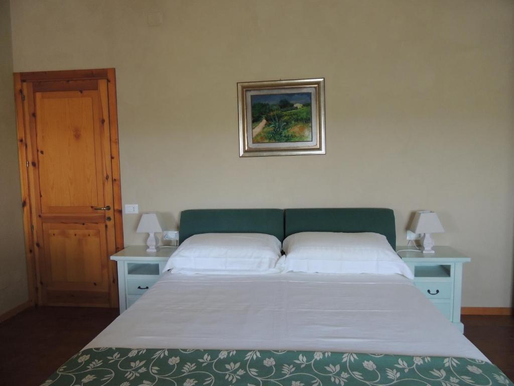 Postel nebo postele na pokoji v ubytování Casa Sabbatini