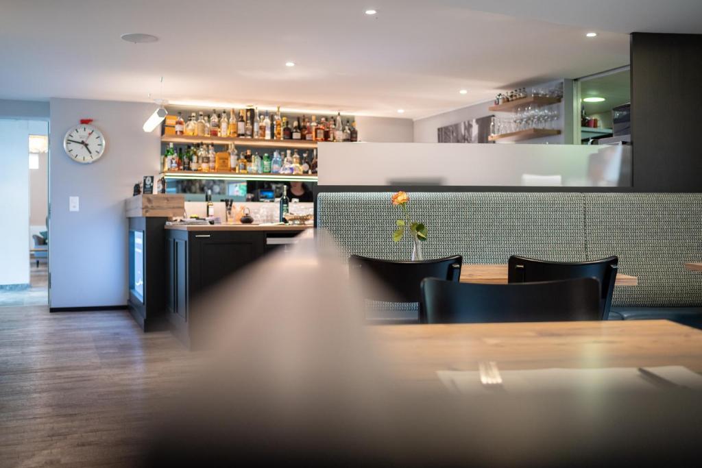 Lounge oder Bar in der Unterkunft Hotel Gerig