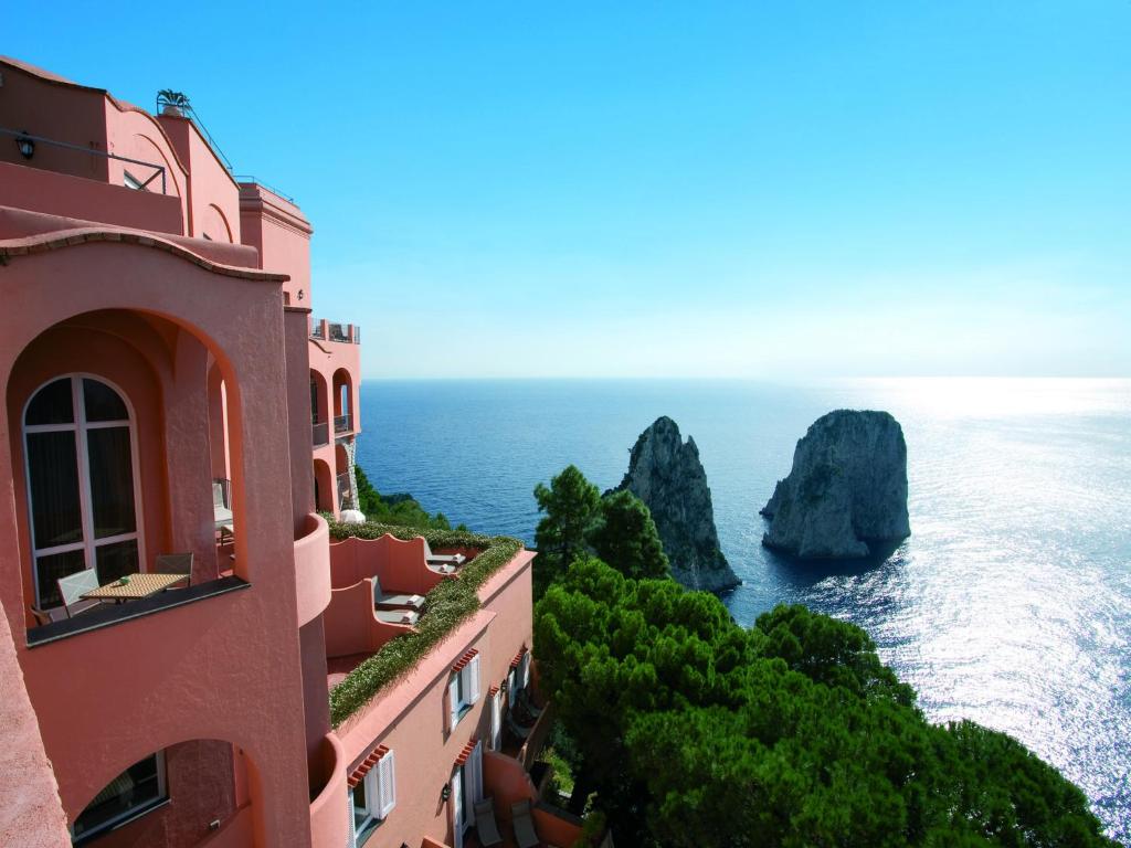 a view of the ocean from a building at Hotel Punta Tragara in Capri