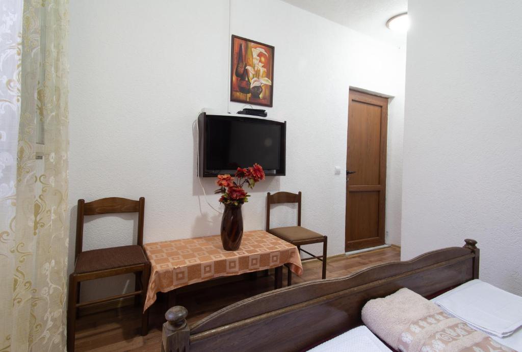 TV a/nebo společenská místnost v ubytování Apartments Oliva