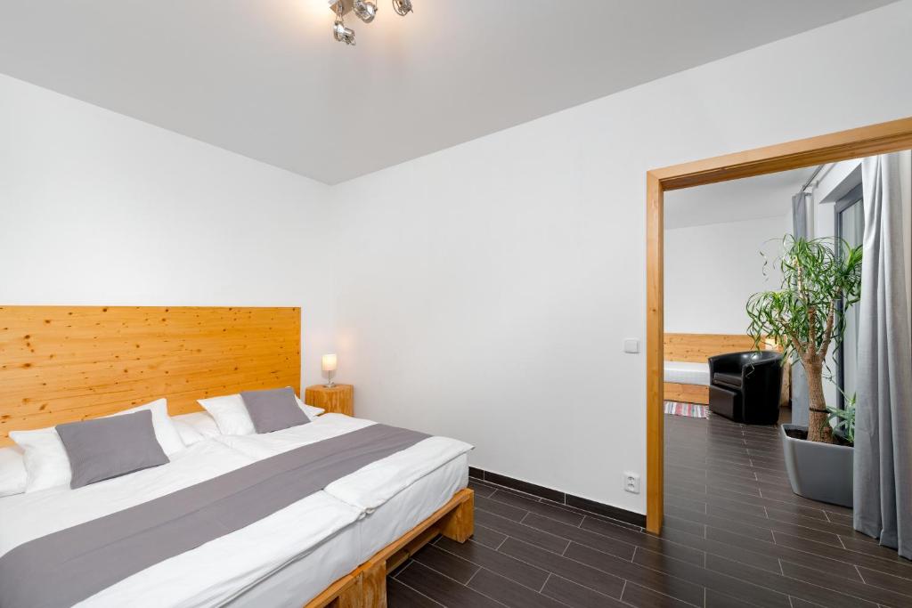 Postel nebo postele na pokoji v ubytování Relax Zone Vrchovina