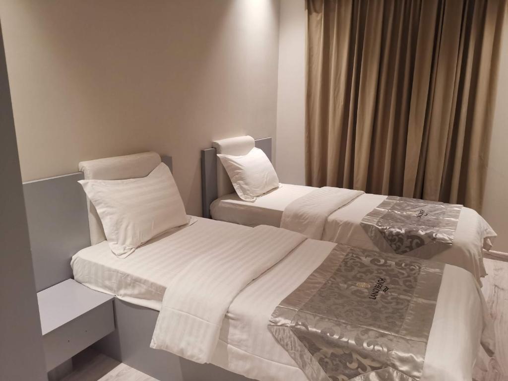 Cama o camas de una habitación en Land Beach An Narjis