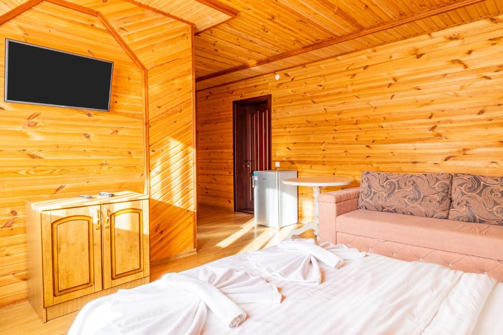 Postel nebo postele na pokoji v ubytování Zeleniy Bir