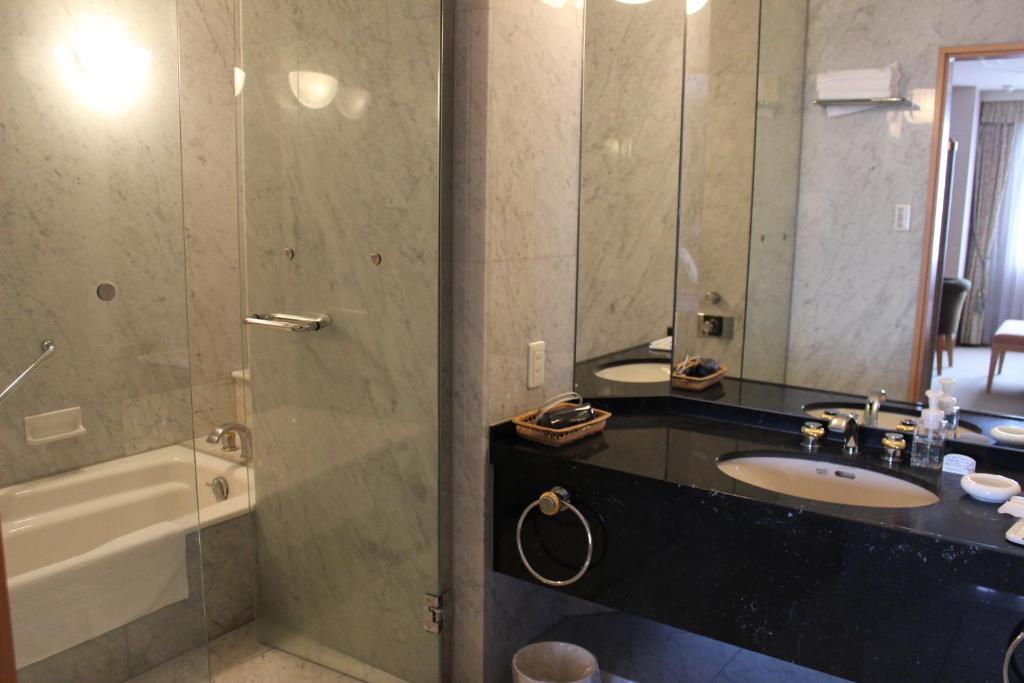 Koupelna v ubytování Grand Hotel Hakusan