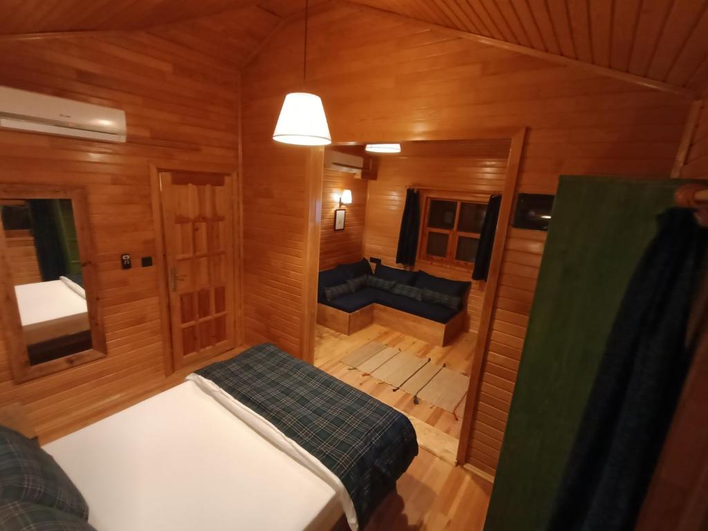 Postel nebo postele na pokoji v ubytování Lycia Nature House