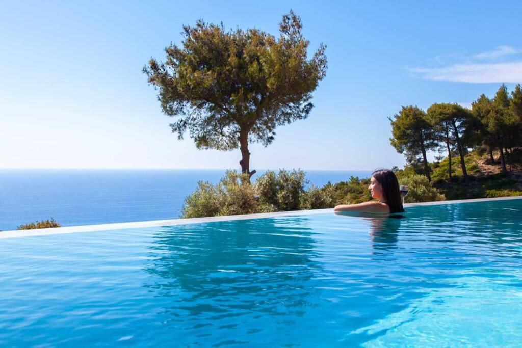 Swimming pool sa o malapit sa Villa Mirtes with breathtaking sea view,close to Porto Katsiki and Egremni