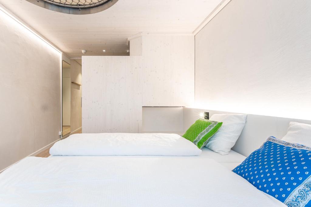Postel nebo postele na pokoji v ubytování Seminarhotel Lihn