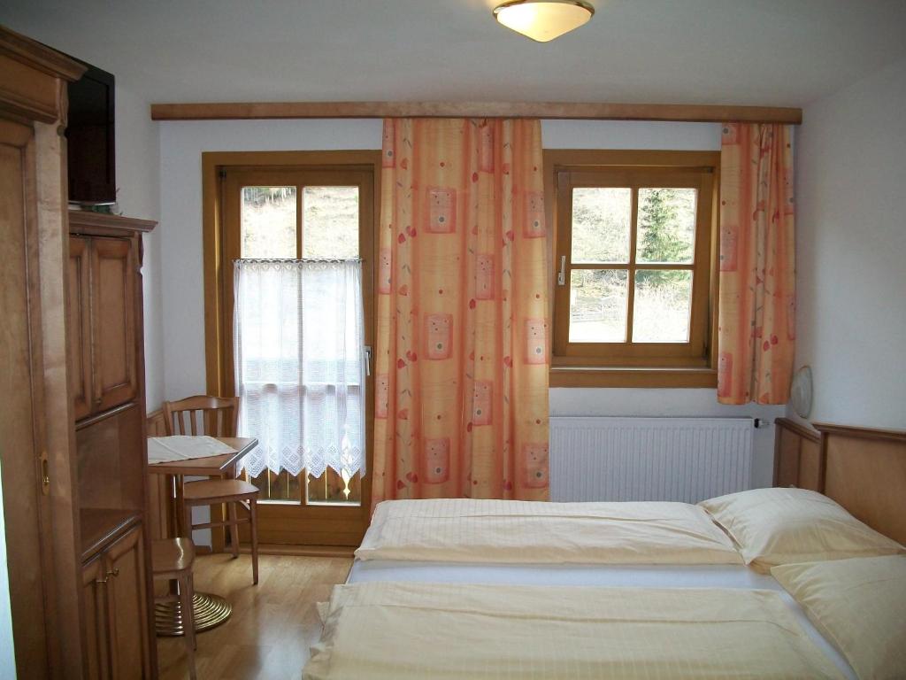 Postel nebo postele na pokoji v ubytování Pension Zechnerhof