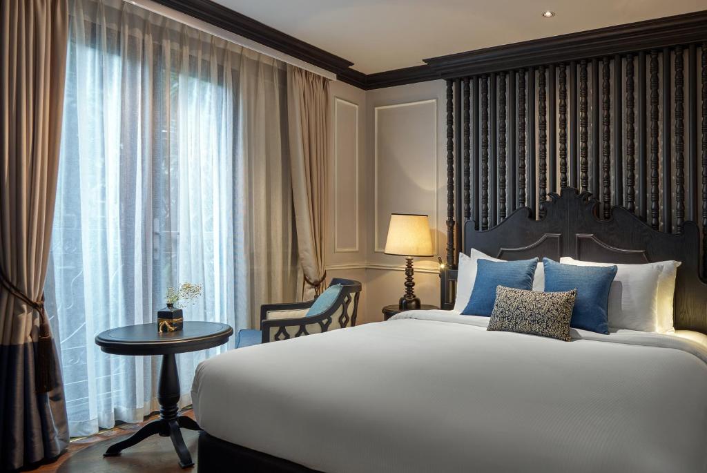Кровать или кровати в номере Aira Boutique Hanoi Hotel & Spa
