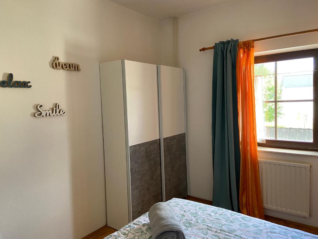Postel nebo postele na pokoji v ubytování Apartments Vidmar near Bled