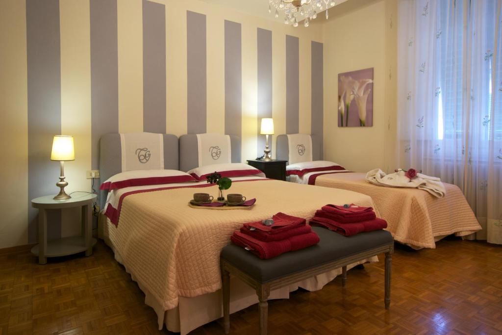 A bed or beds in a room at Terrazza Ginori