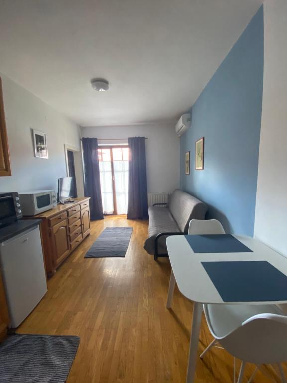 Kuchyň nebo kuchyňský kout v ubytování Apartments Vidmar near Bled