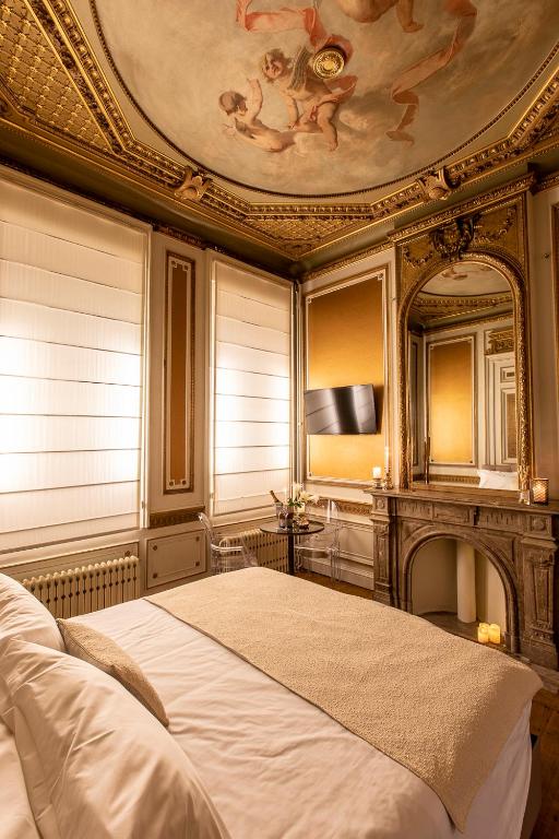 Postel nebo postele na pokoji v ubytování Maison Noppius - Love Hotel