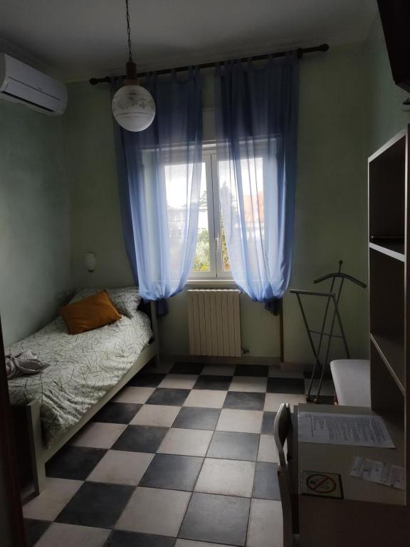 Łóżko lub łóżka w pokoju w obiekcie Guest house Il Nido