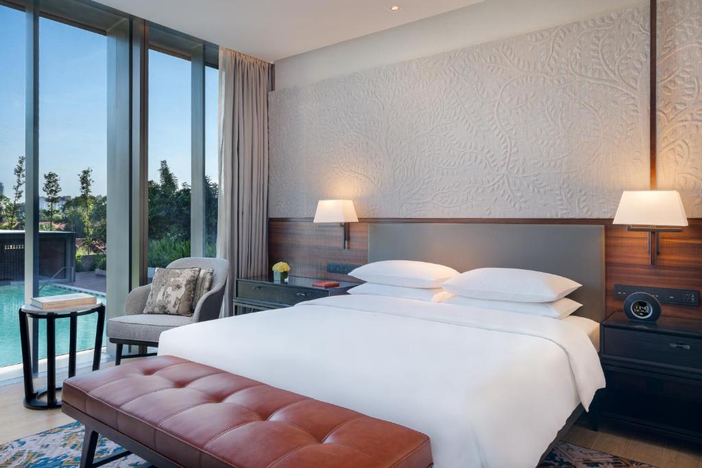 Postel nebo postele na pokoji v ubytování Hyatt Regency Phnom Penh