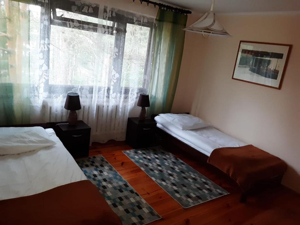 Posteľ alebo postele v izbe v ubytovaní Forest Villa