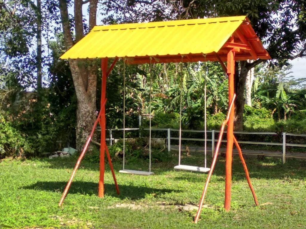 Herní místnost nebo prostor pro děti v ubytování Tanjong Tinggi Cottage