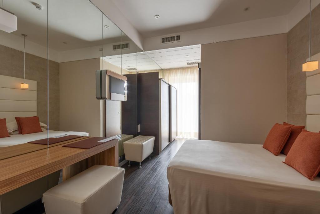 A bed or beds in a room at Bio Boutique Hotel XU' - Gruppo Ambienthotels