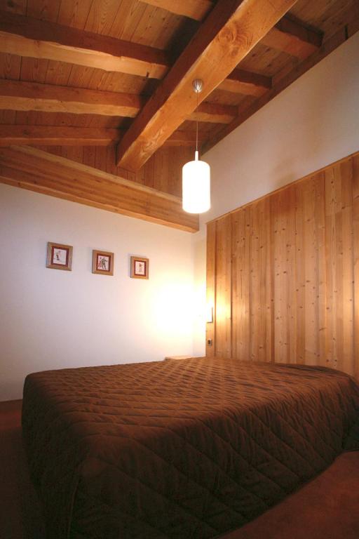 Postel nebo postele na pokoji v ubytování Vacancéole - Résidence l'Alba