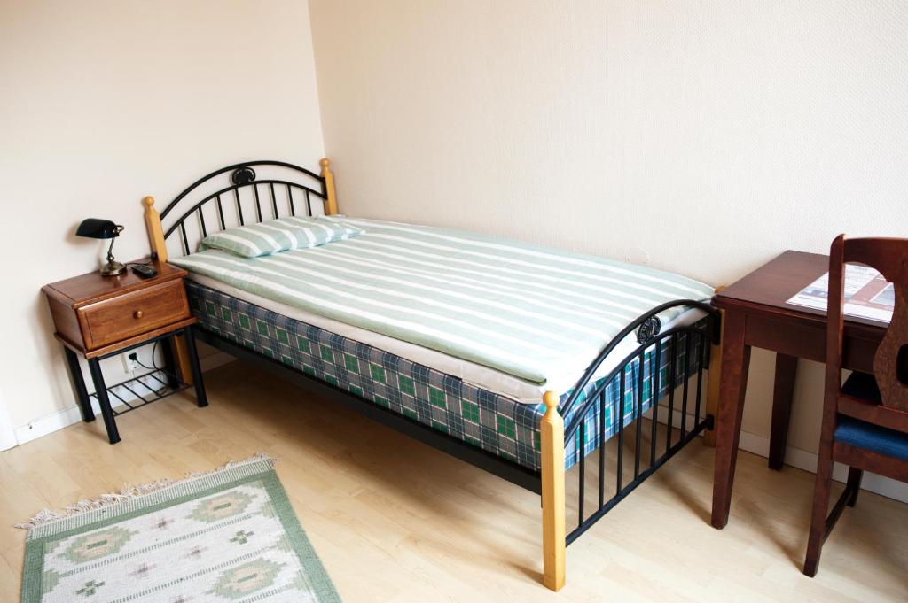 Postel nebo postele na pokoji v ubytování Reftele Wardshus