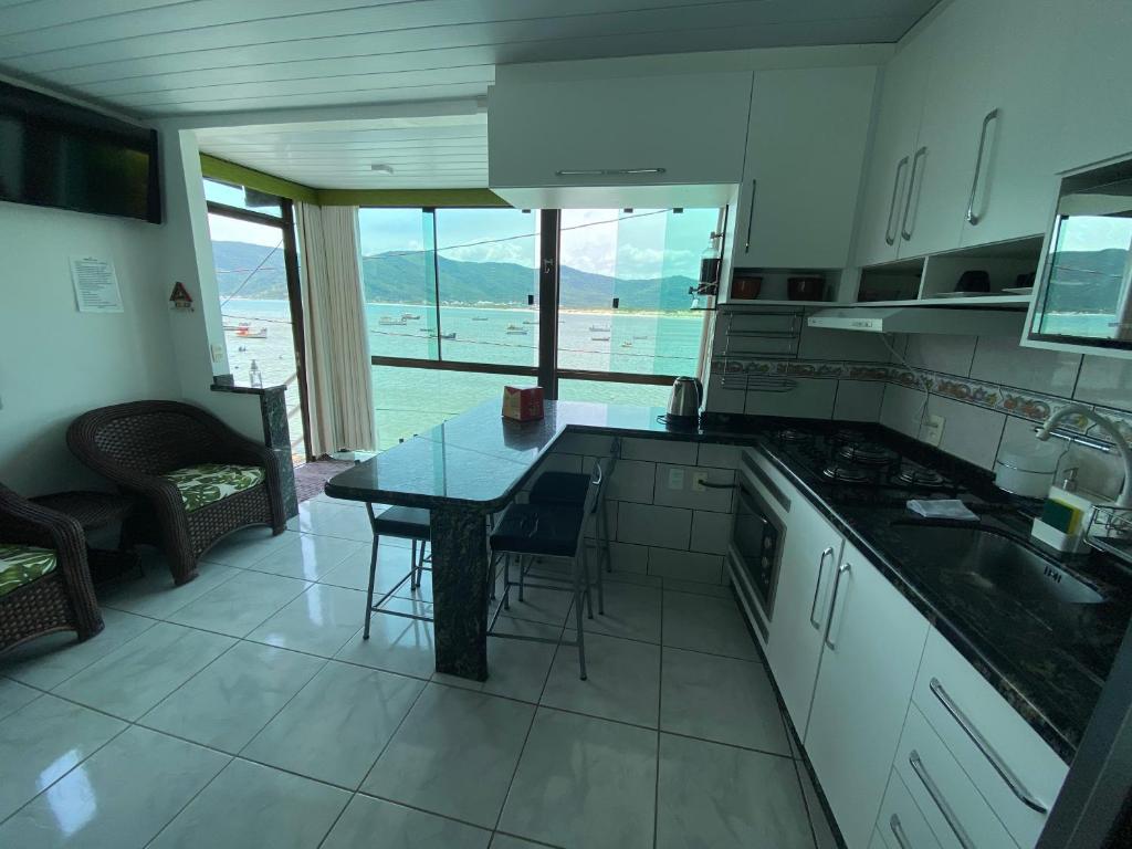  Casa de frente para o mar - Casa 01
