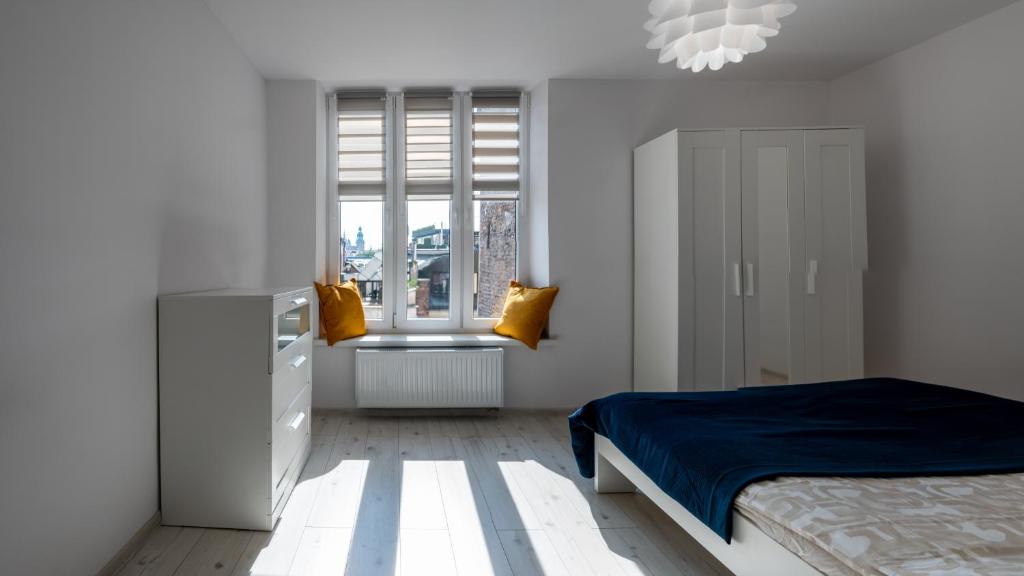 Posteľ alebo postele v izbe v ubytovaní Super Central Apartment Sienna street