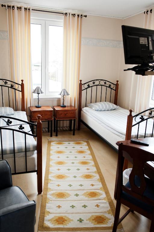 Postel nebo postele na pokoji v ubytování Reftele Wardshus