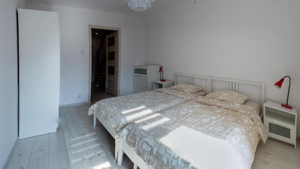 Posteľ alebo postele v izbe v ubytovaní Super Central Apartment Sienna street