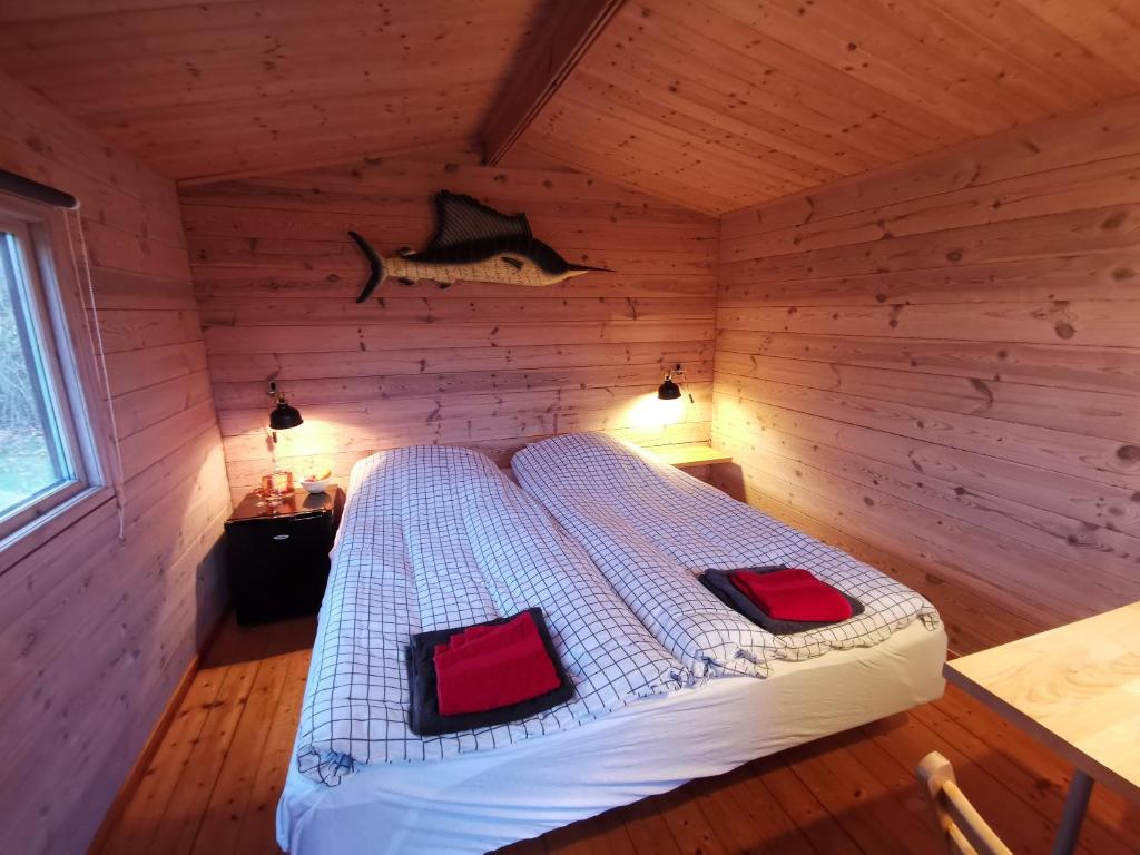 Postel nebo postele na pokoji v ubytování Limfjords hytter