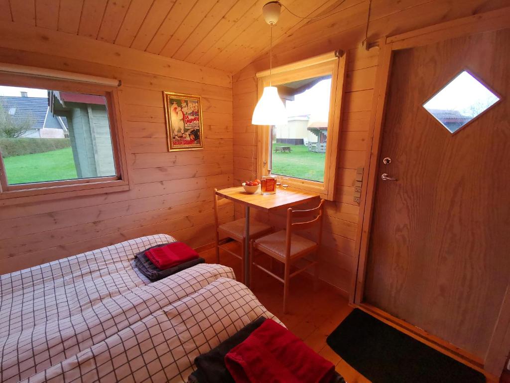 Postel nebo postele na pokoji v ubytování Limfjords hytter