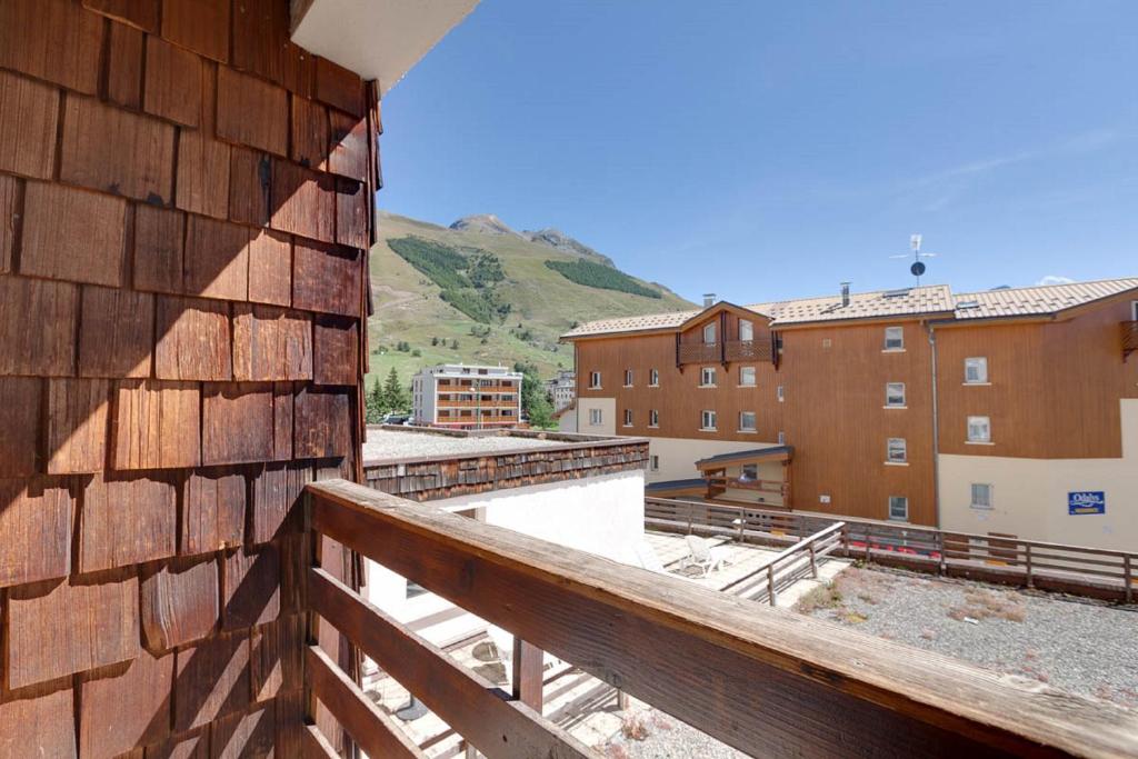 a view from the balcony of a building at Vacancéole - Résidence Les Bleuets in Les Deux Alpes