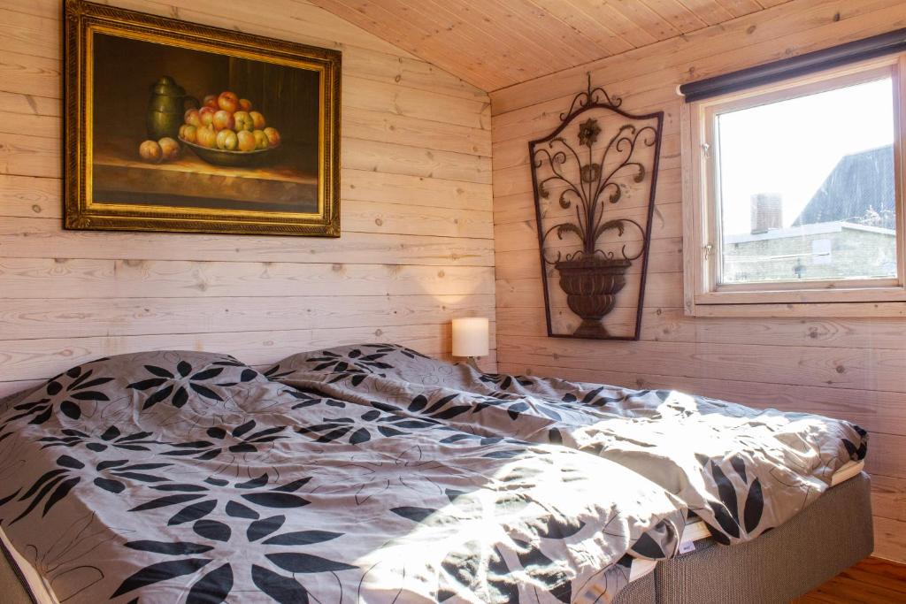 Postel nebo postele na pokoji v ubytování Limfjords hytter