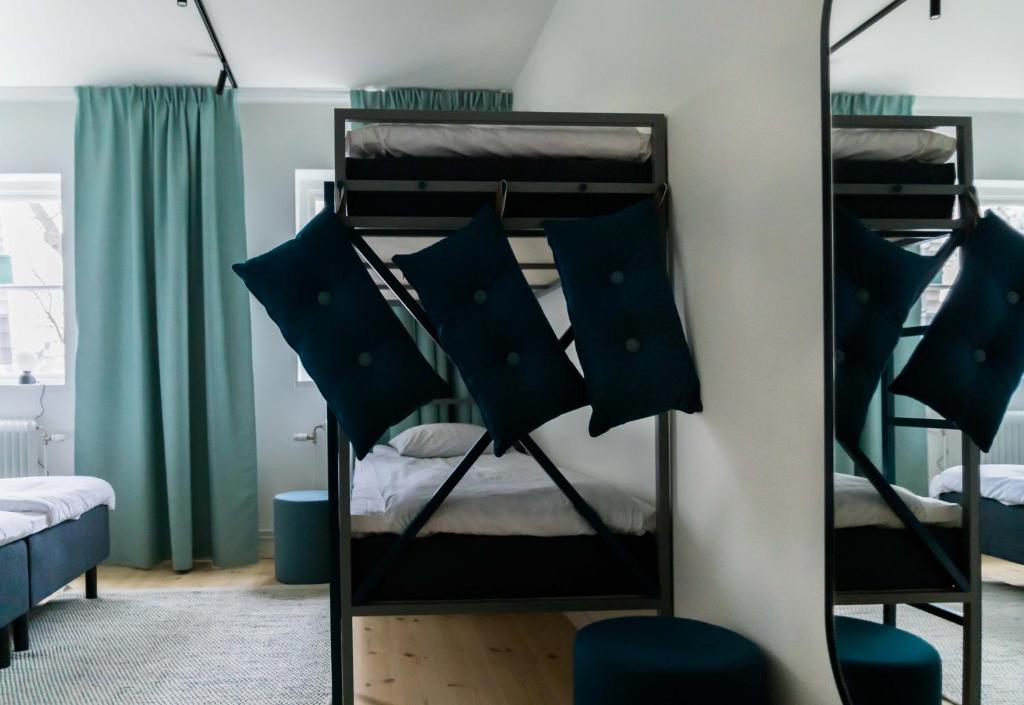 Postel nebo postele na pokoji v ubytování STF Stockholm Skeppsholmen Vandrarhem