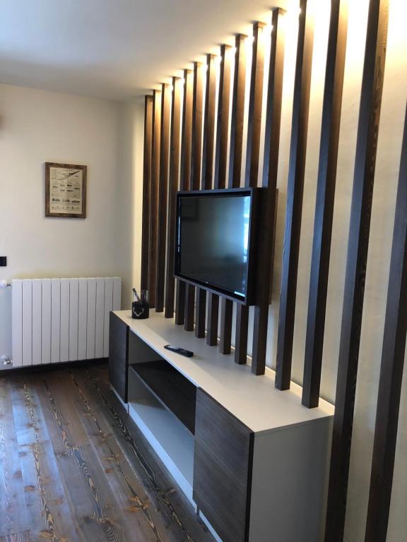 TV a/nebo společenská místnost v ubytování Hotel De Champoluc