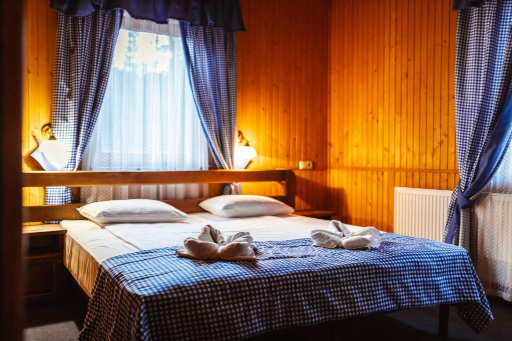 Un ou plusieurs lits dans un hébergement de l'établissement Royal Village Resort