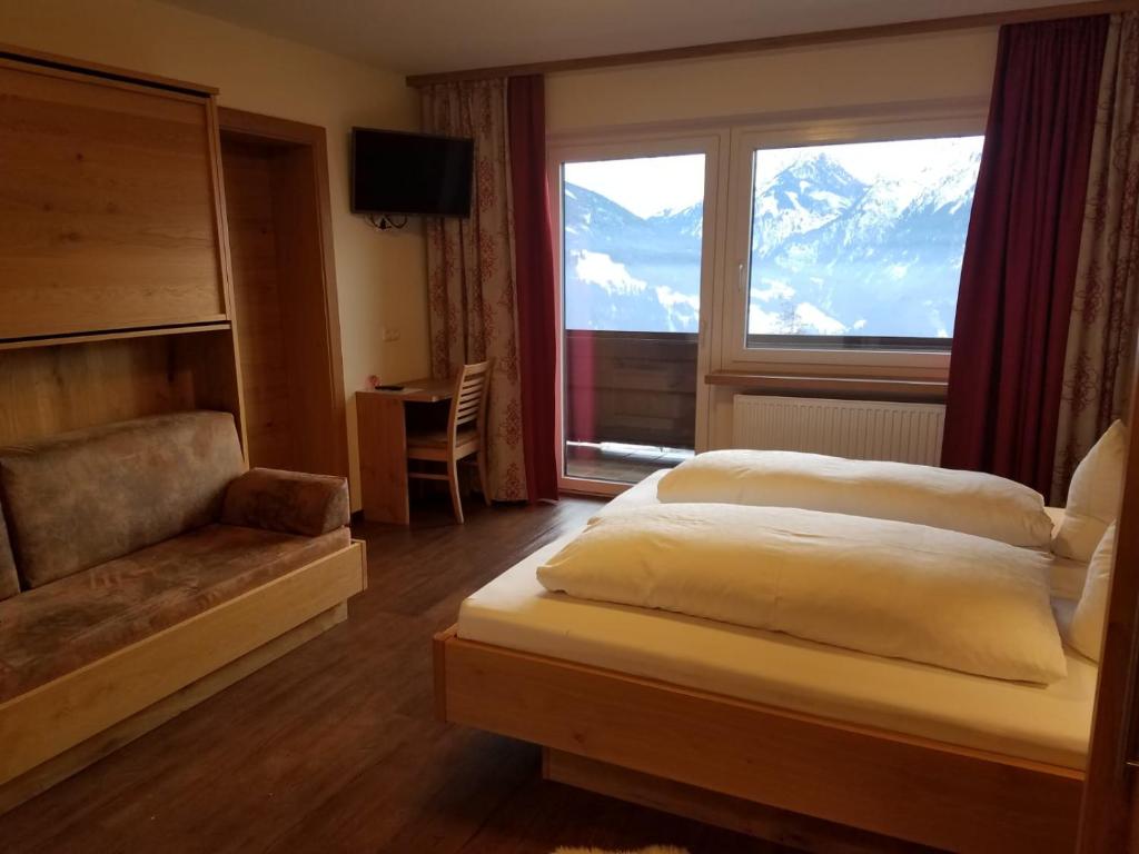 Postel nebo postele na pokoji v ubytování Aparthotel Hohe Brücke