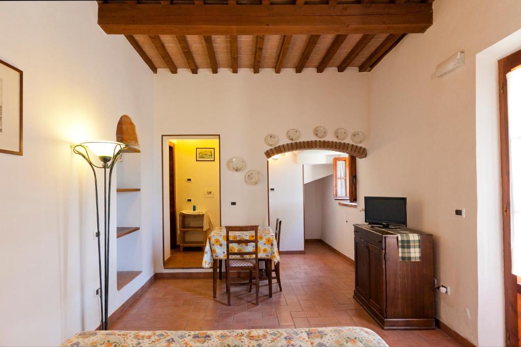 Telewizja i/lub zestaw kina domowego w obiekcie Garden Relais Le Fontanelle
