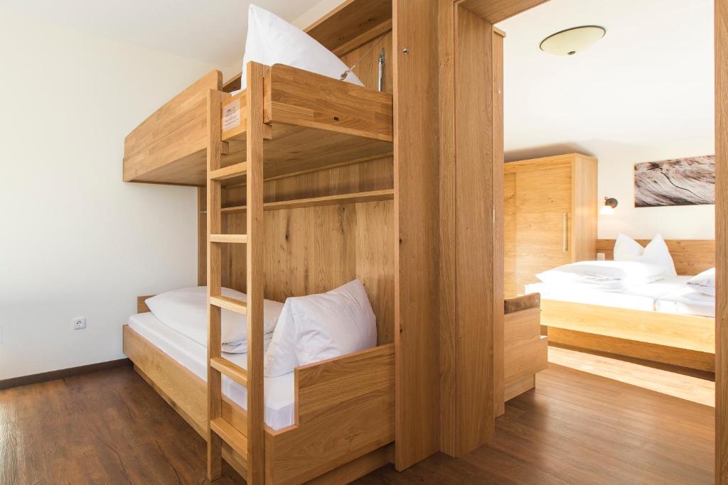 Postel nebo postele na pokoji v ubytování Aparthotel Hohe Brücke