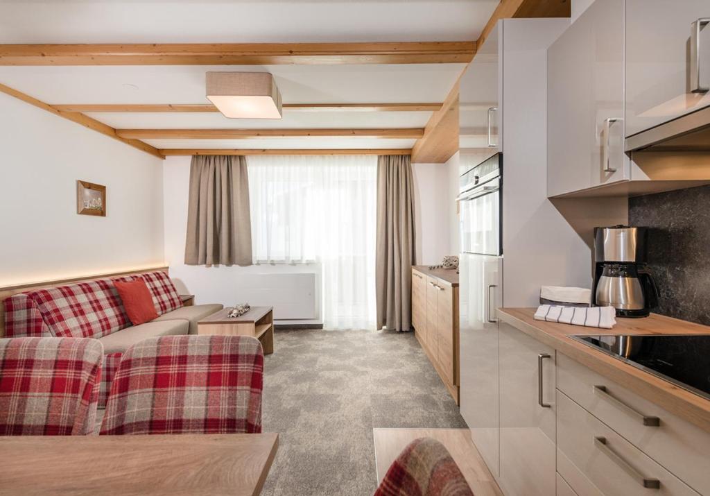 Kuchyň nebo kuchyňský kout v ubytování Apartments & Garni Alpenrose