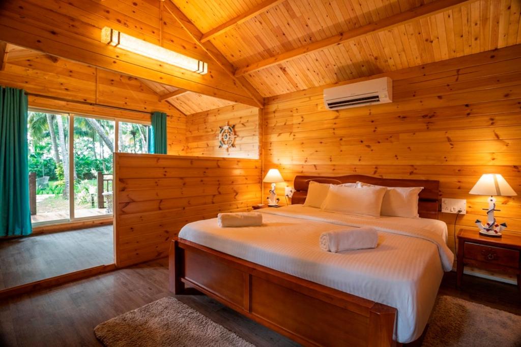 Postel nebo postele na pokoji v ubytování Montego Bay Beach Village - Morjim