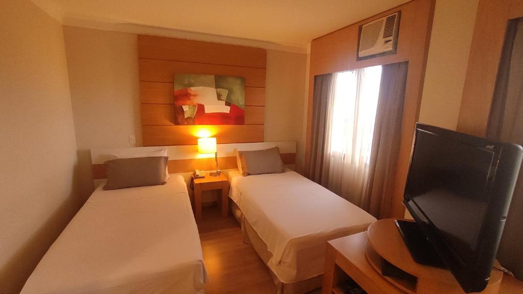  Nobile Suites Particular com cozinha compacta