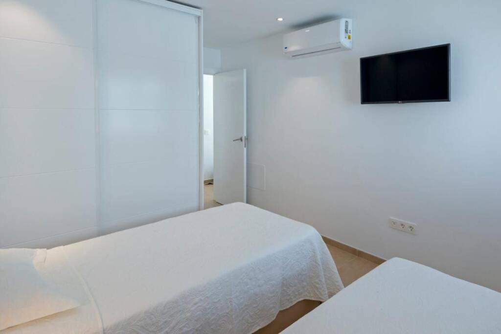 Posteľ alebo postele v izbe v ubytovaní Apartamento Costa Rica