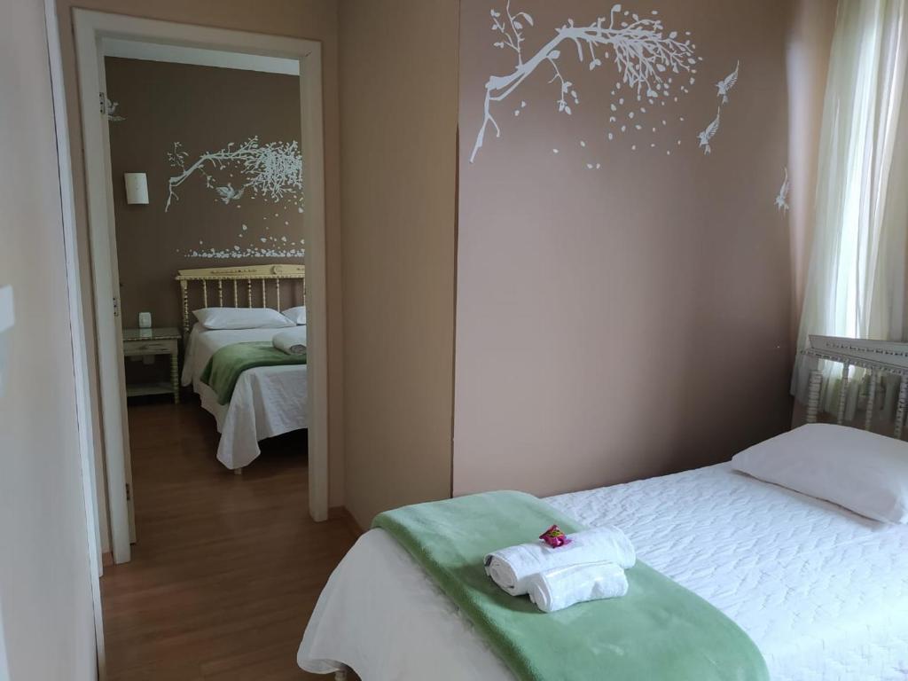 Postel nebo postele na pokoji v ubytování Hotel Domo
